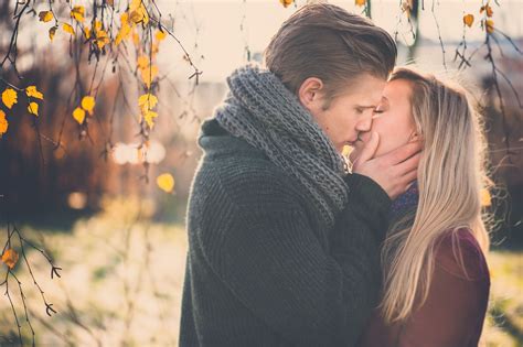 woman and man kissing